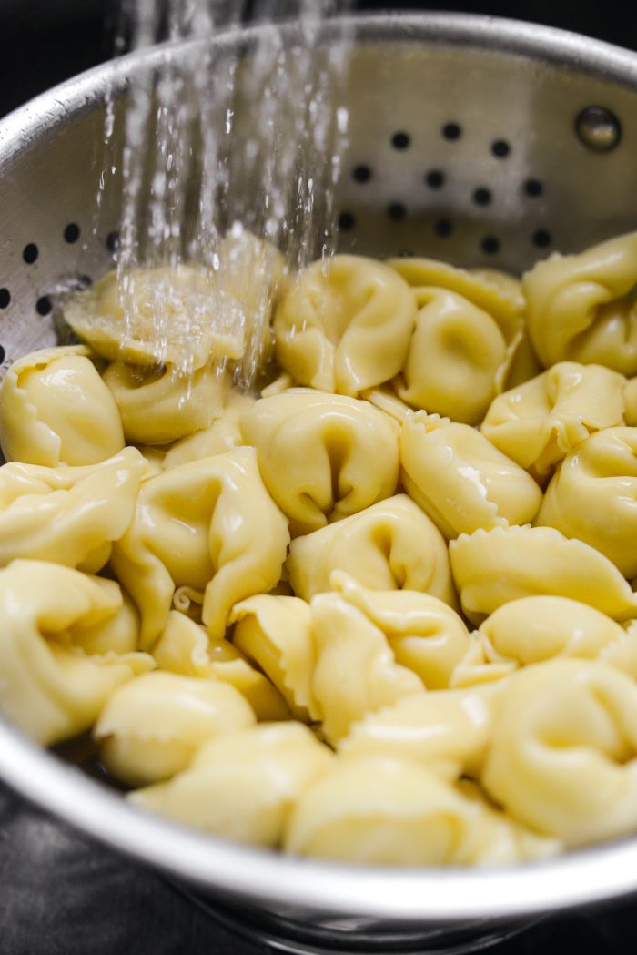 rinse cooked tortellini under cold water