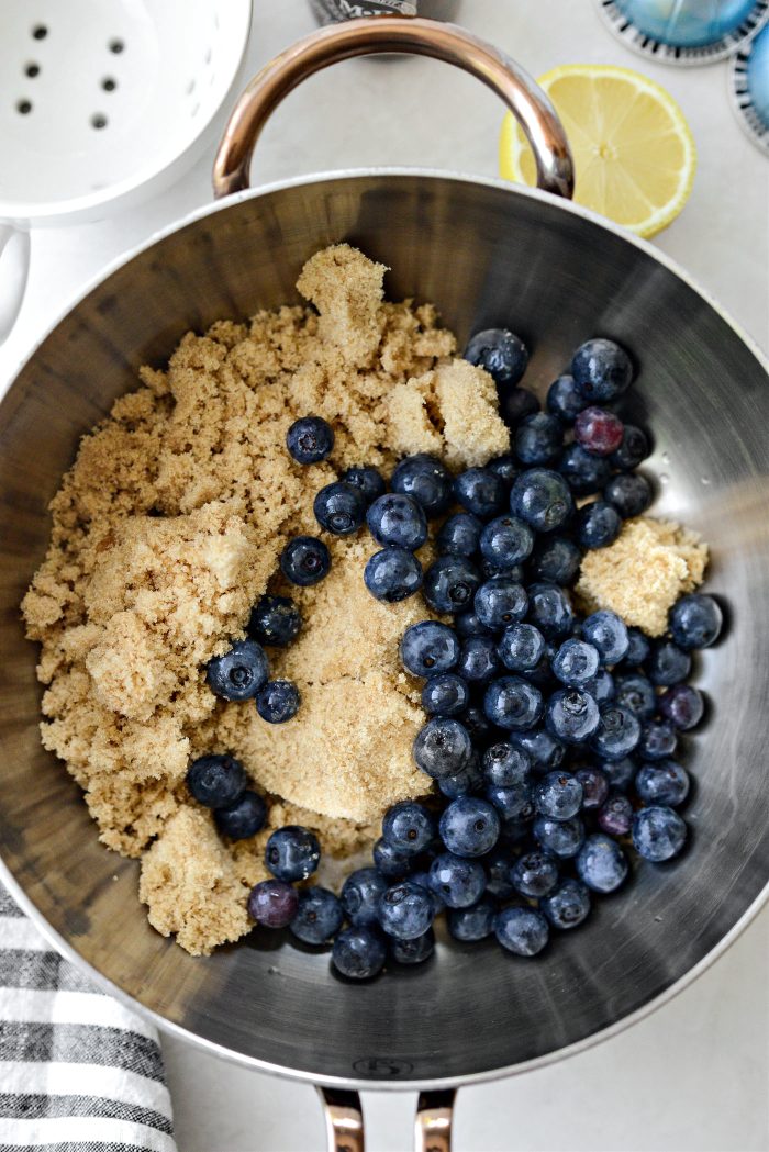 brown sugar and blueberries in a saucepan