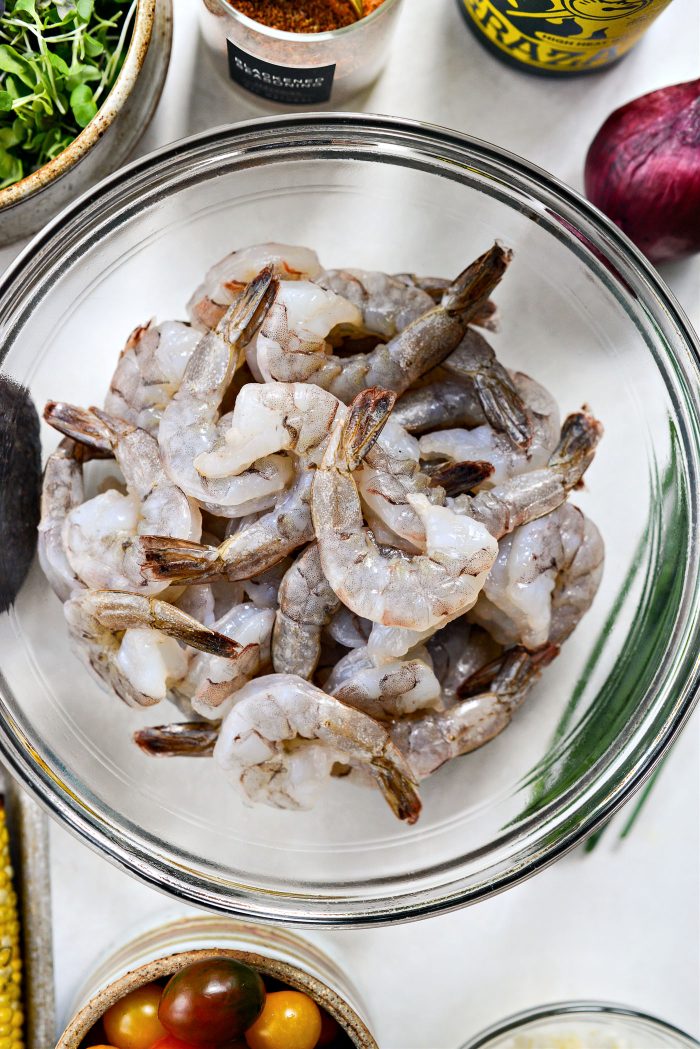 2 pounds of peeled shrimp in a bowl