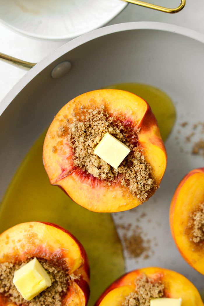 fill each nectarine half with a little spiced brown sugar and a dot of butter