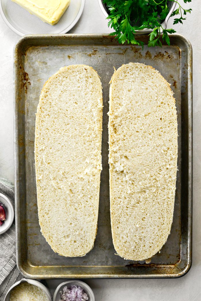 slice bread horizontally and place on large rimmed baking sheet