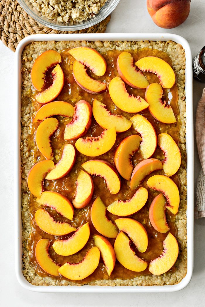 top with sliced peaches