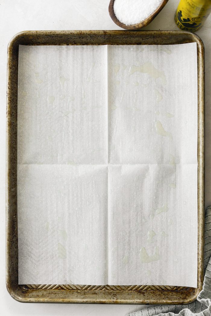 line baking sheet and preheat oven