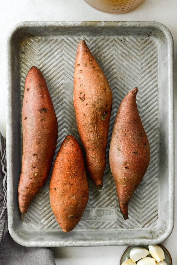 sweet potatoes on baking sheet