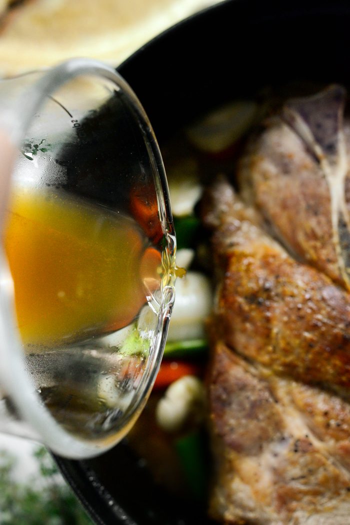 pour in apple cider and broth