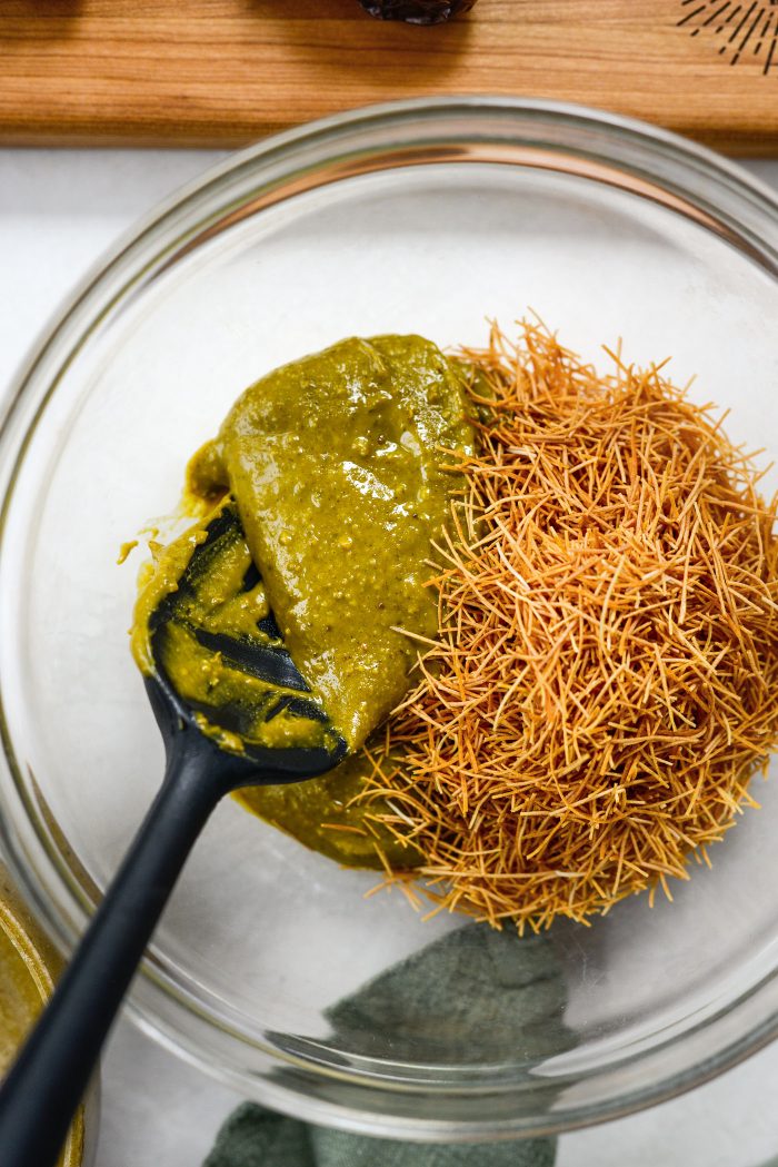 add pistachio cream and kinafi to bowl