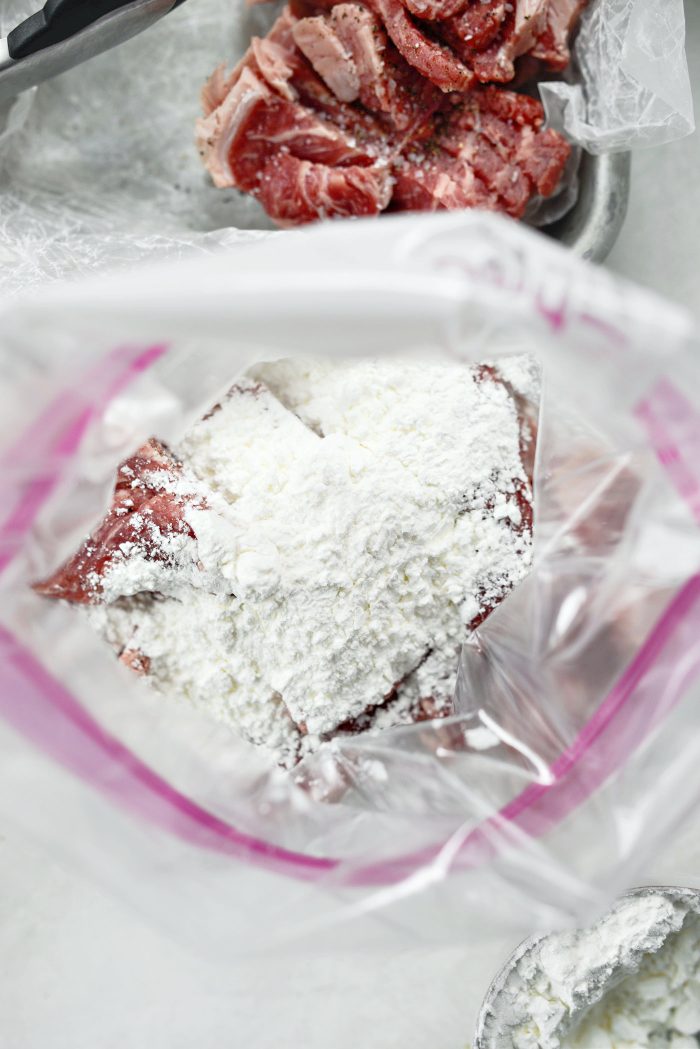steak with cornstarch in bag