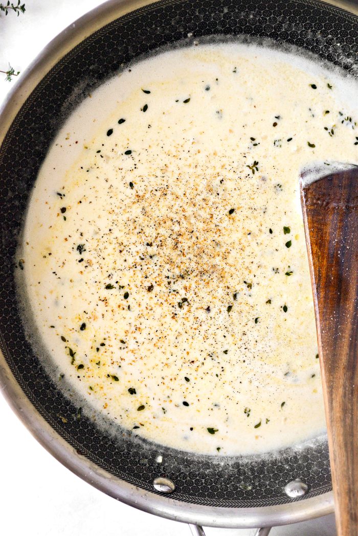 simmer until thickened and then add nutmeg and black pepper