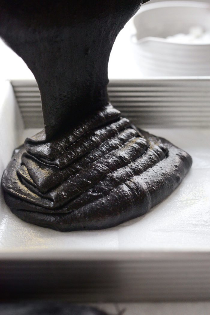 pour brownie batter into prepared pan