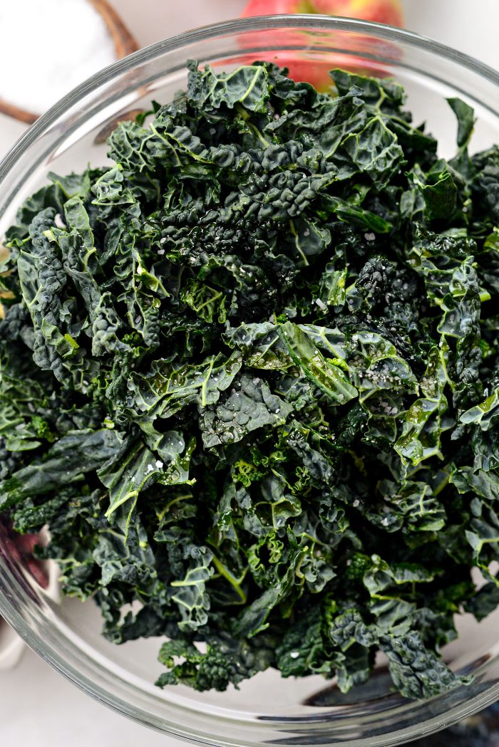 add kale, oil and salt to a bowl