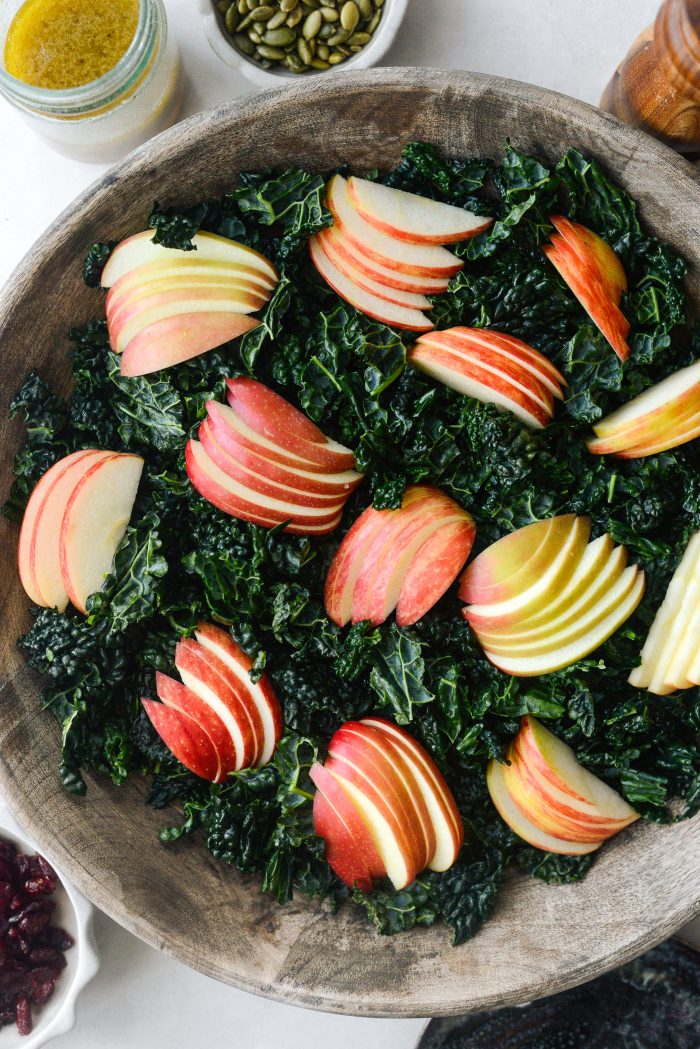 transfer kale to bowl and add apple slices