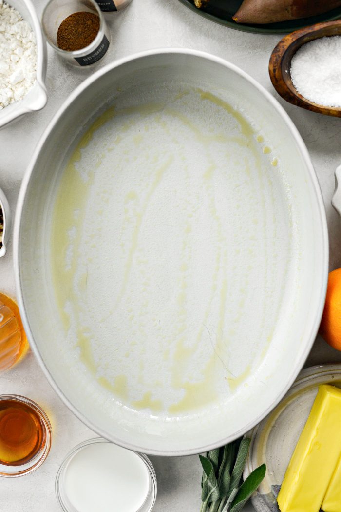 preheat oven and grease casserole with nonstick spray