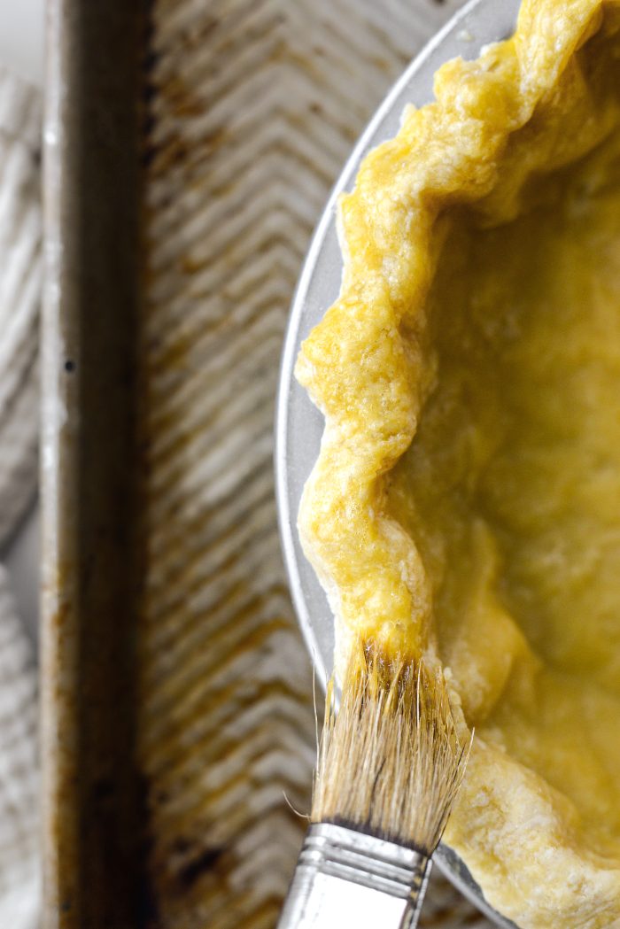 brush pie crust edge with egg wash