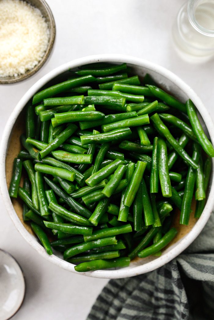 drain green beans, pat dry and cut into half or thirds