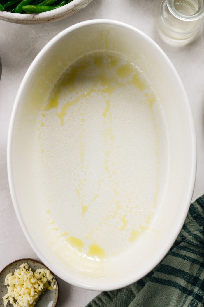 spray a casserole dish with nonstick spray and preheat oven