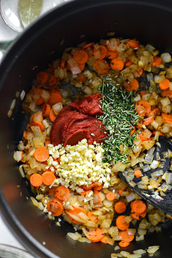 add tomato paste, garlic and rosemary to veggies