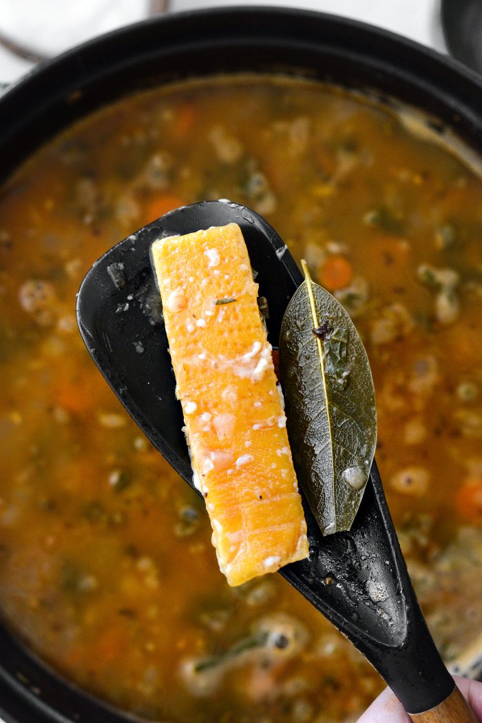 remove parm rind and bay leaf