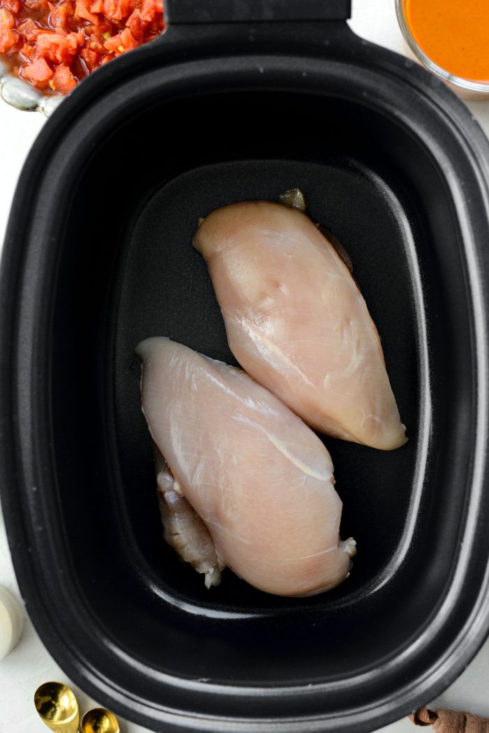 add chicken breasts to slow cooker