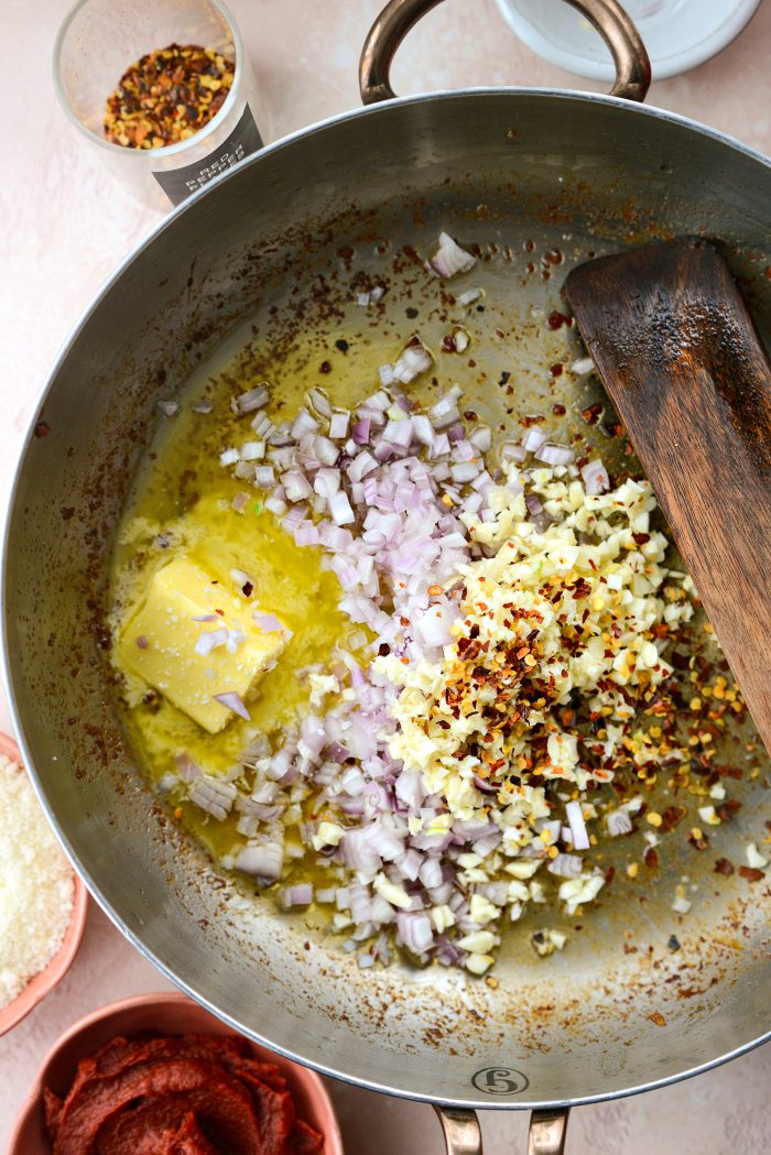 add butter, shallot, garlic, red pepper flakes and salt to skillet