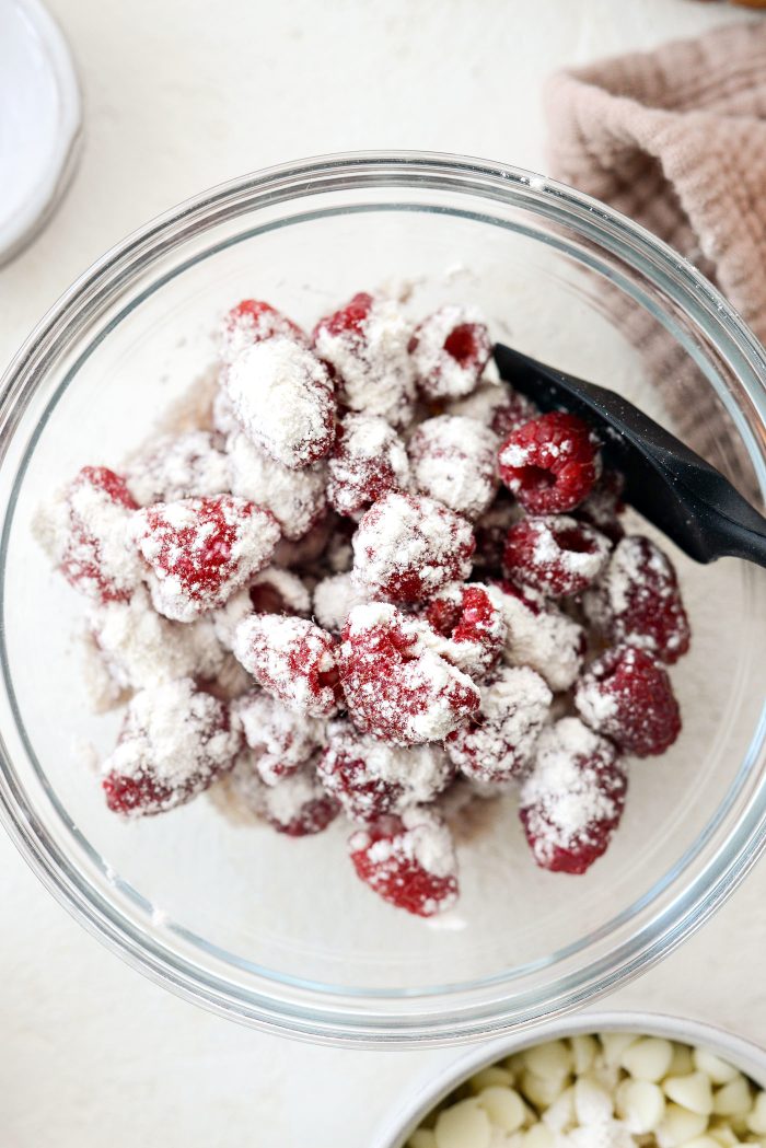 toss raspberries in a little flour