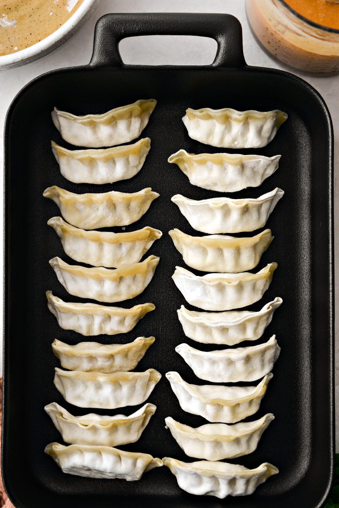 arrange dumplings in pan