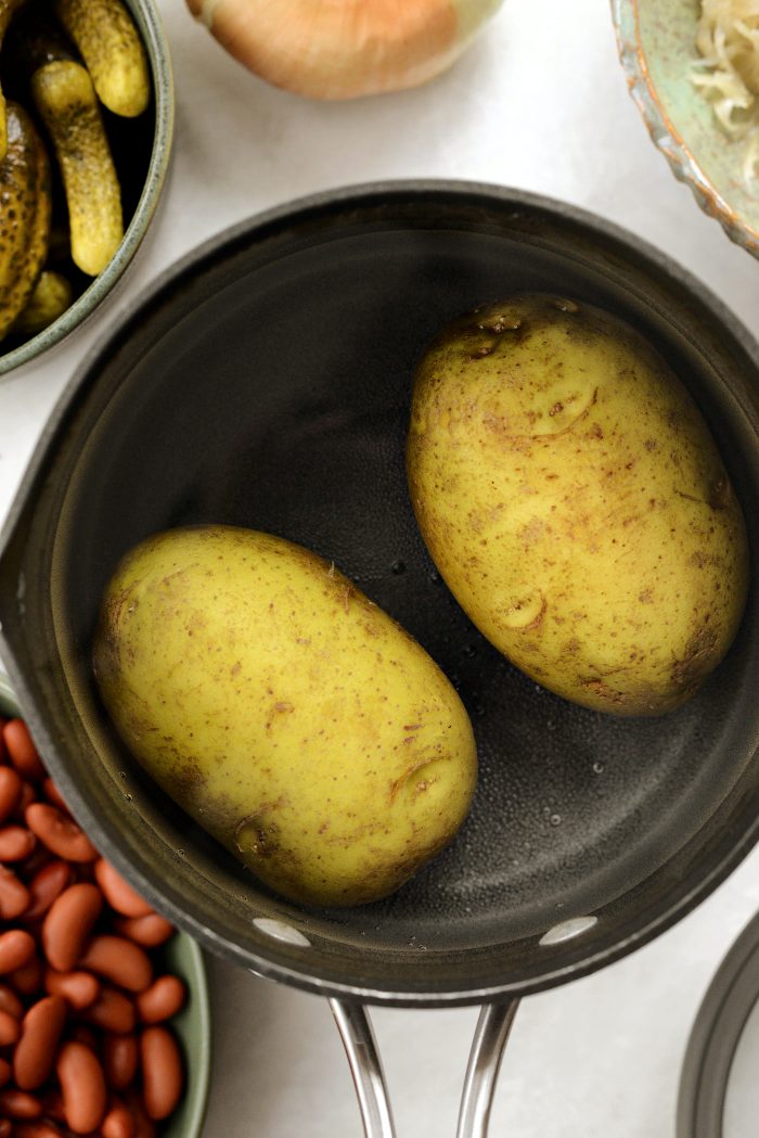 add potatoes to a pot of water