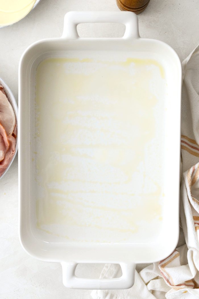 spray 2 baking dishes