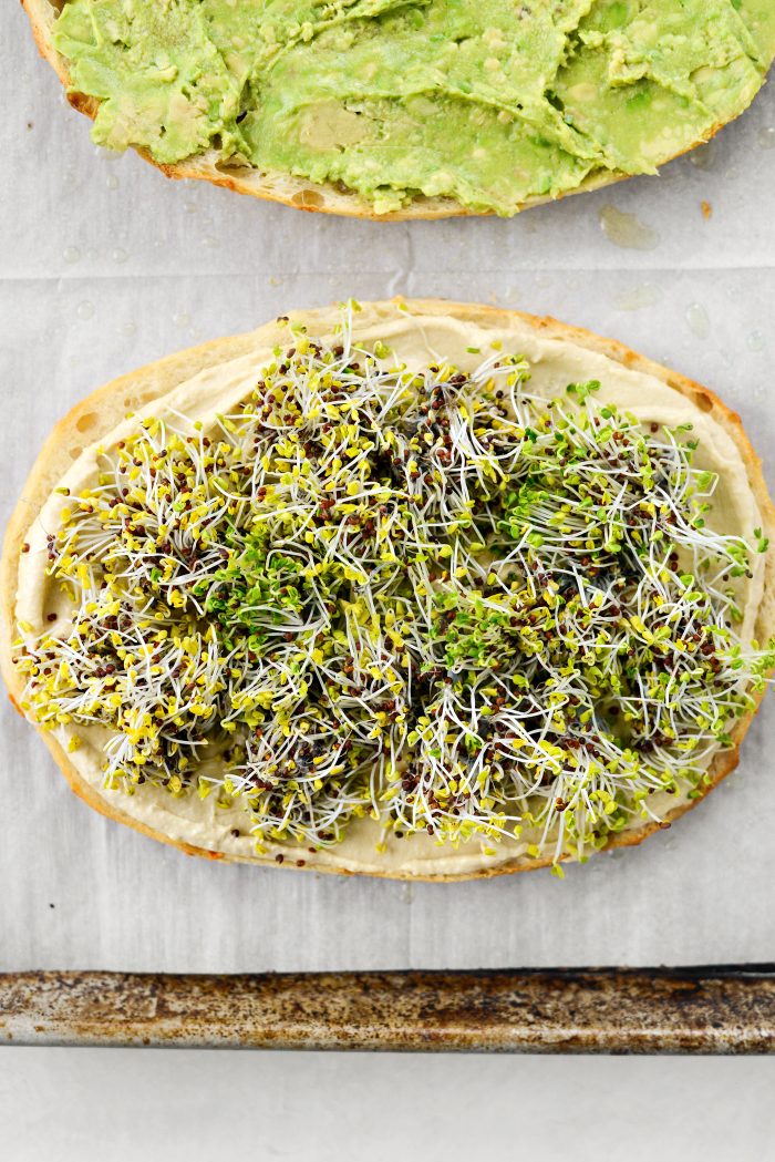 top hummus with sprouts