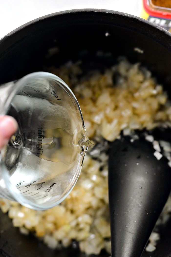 once cooked, pour in wine and simmer until reduced by half