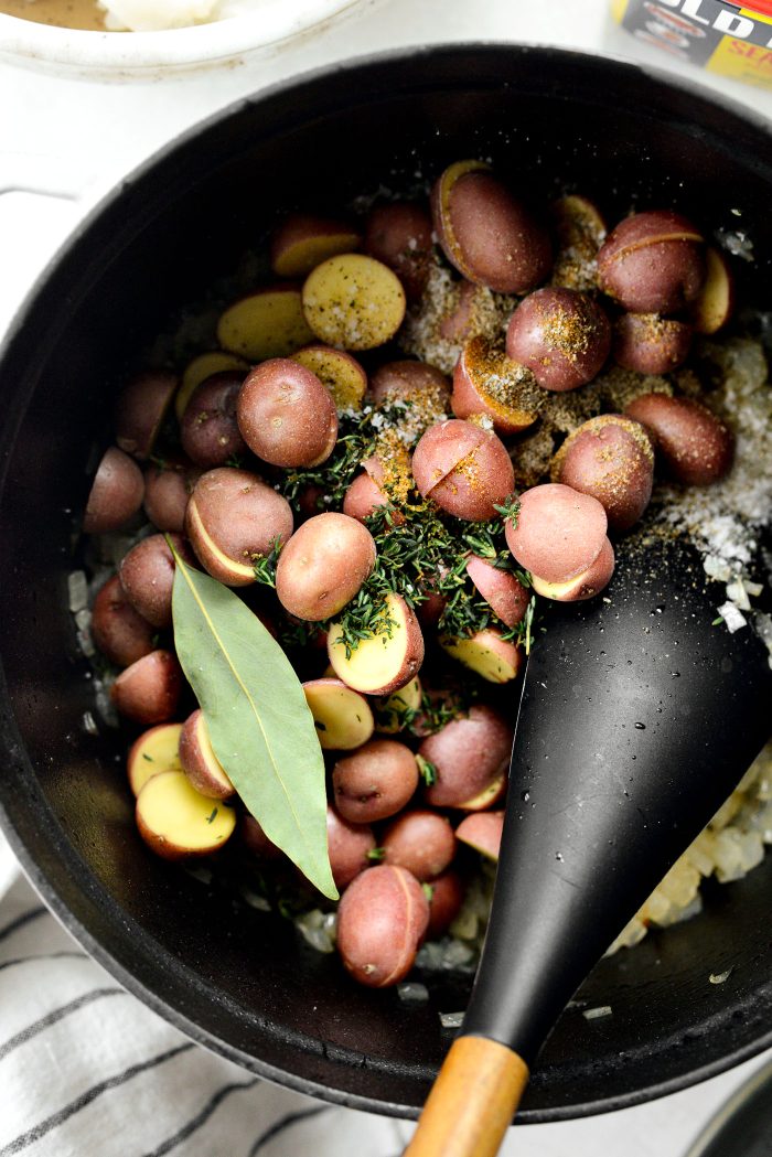 add potatoes, thyme, old bay, salt, pepper and bay leaf to the pot
