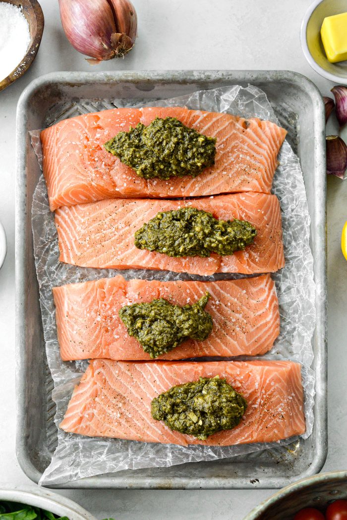 seasoned salmon topped with pesto
