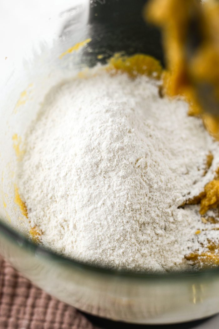 add in half of flour mixture, blend and then add the rest