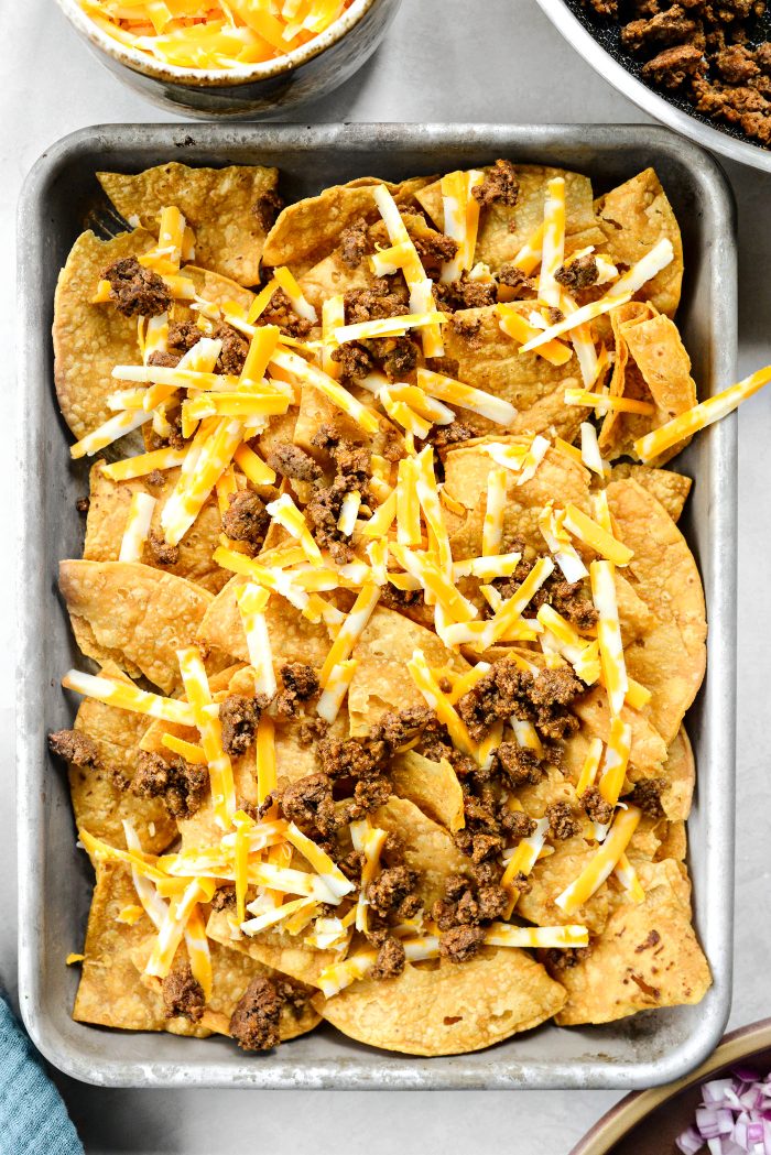 top with cheese and some of the meat