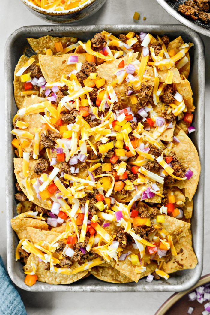 top with peppers and onions