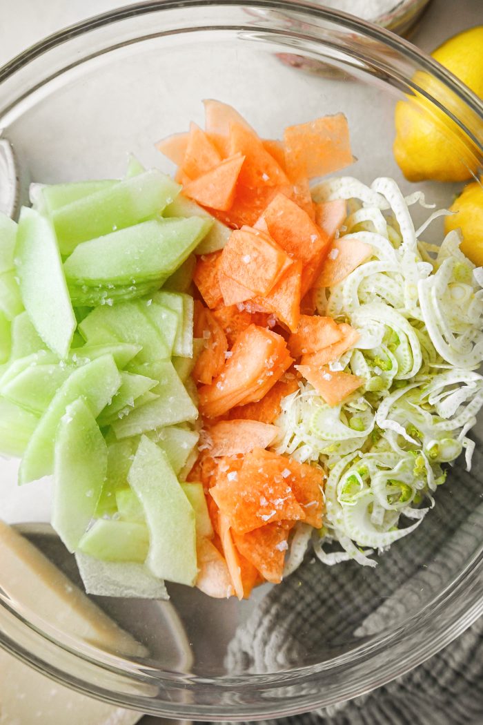 Fennel, melon and salt in a bowl