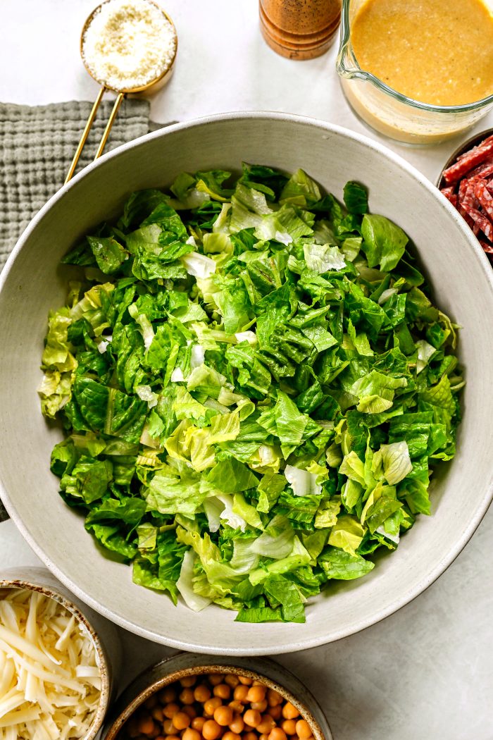 add lettuces to a large bowl