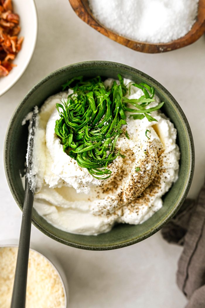 add basil, salt and pepper to ricotta