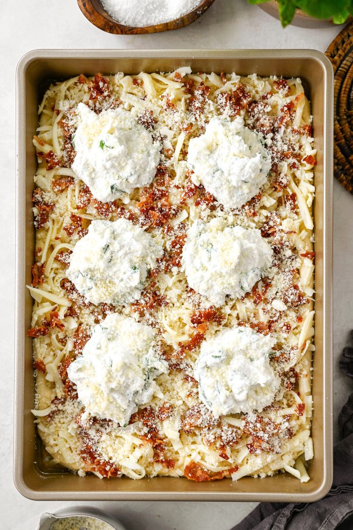top with ricotta and parmesan cheese