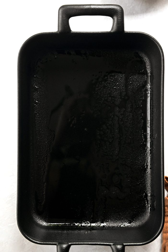 spray baking pan and preheat oven to