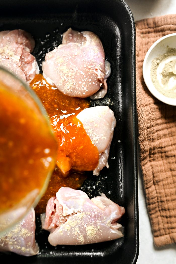 pour glaze over chicken thighs