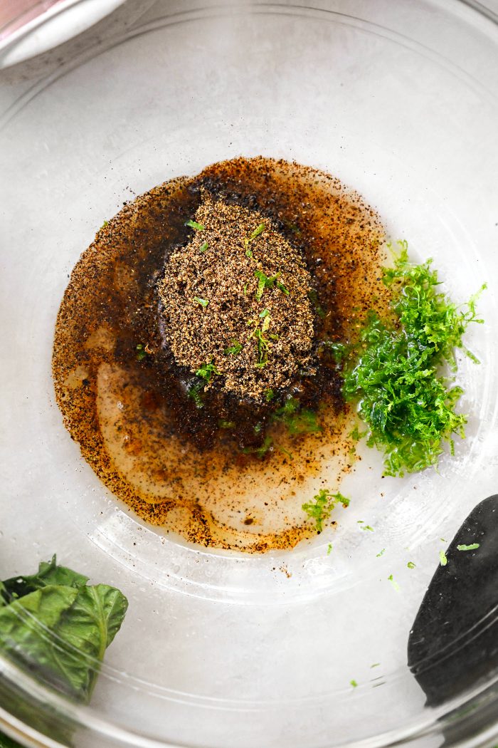 add oil, chicken taco seasoning, lime zest and juice and salt to a mixing bowl.