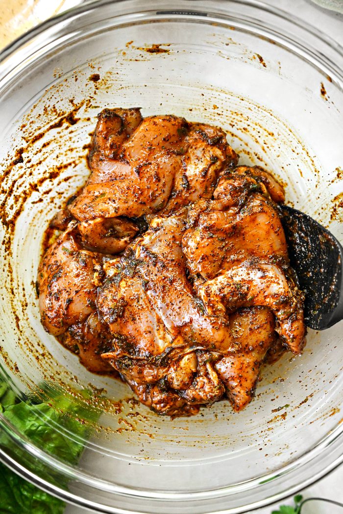 Toss the chicken thighs in the marinade
