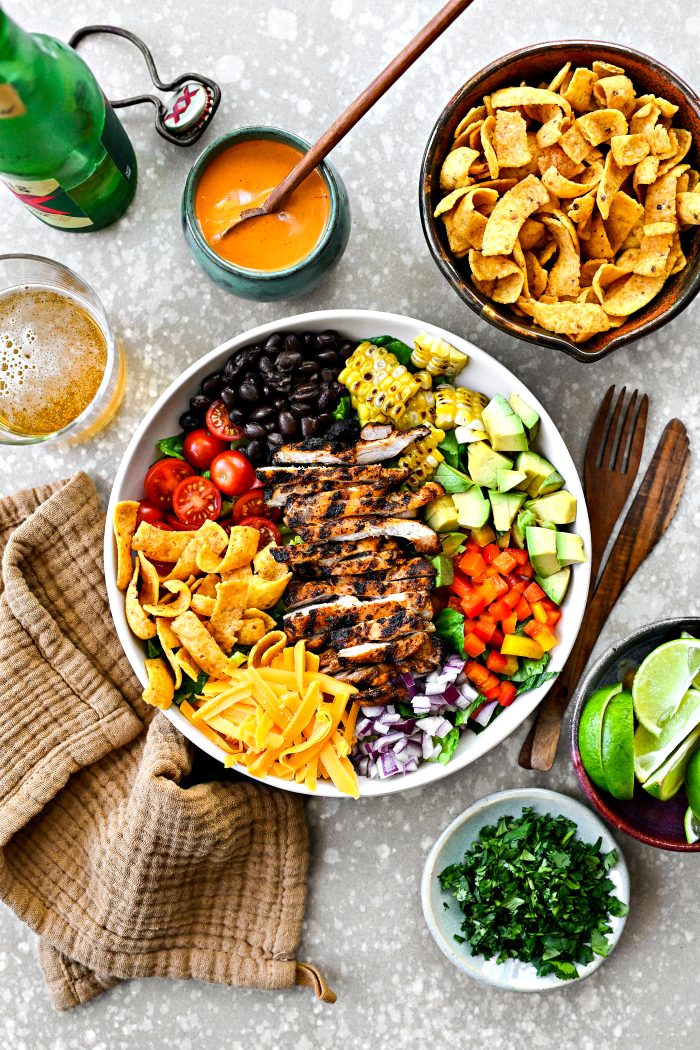 add salad ingredients to a bowl