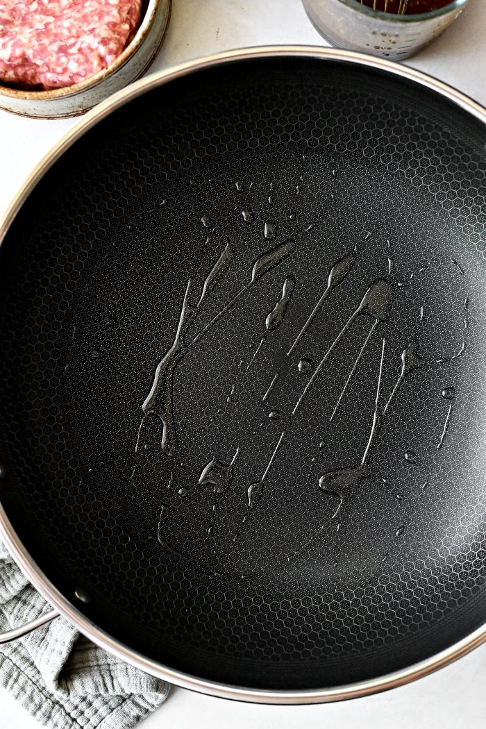 add oil to wok and heat