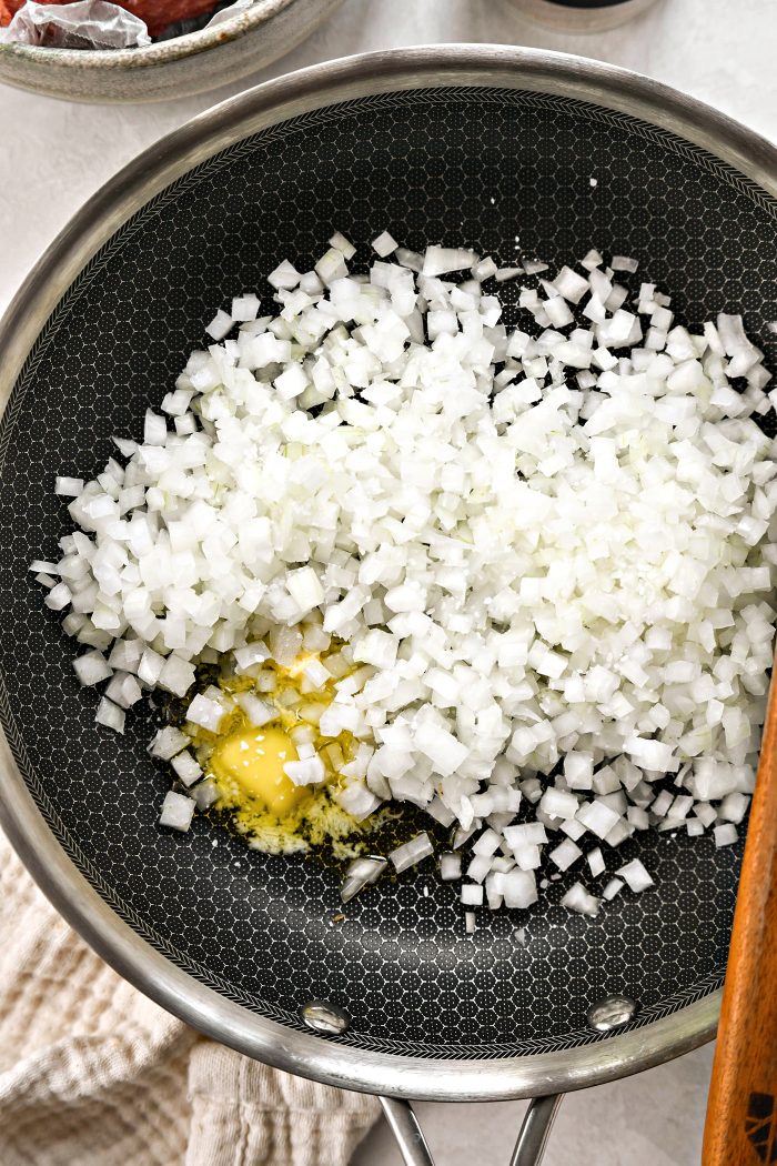 butter and onions in skillet